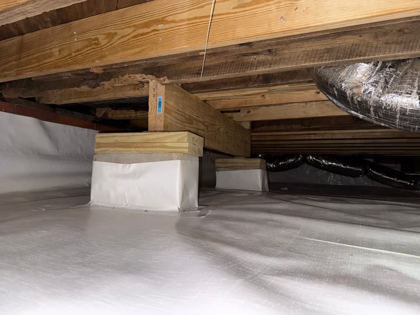 HydroHelp911 Crawl Space & Foundation Repair installing crawl space support jacks under a vapor barrier